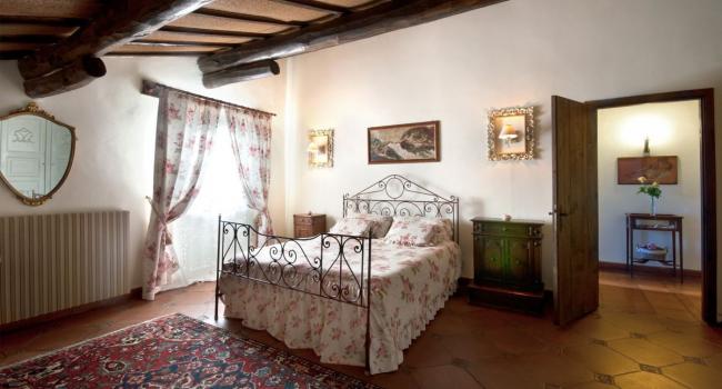 Dormitorio familiar: Suite Nespolo